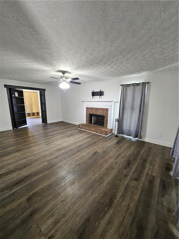 291 Sterling Trail Powder Springs, GA 30127 - Photo 5 of 43 a view of a livingroom with a fireplace