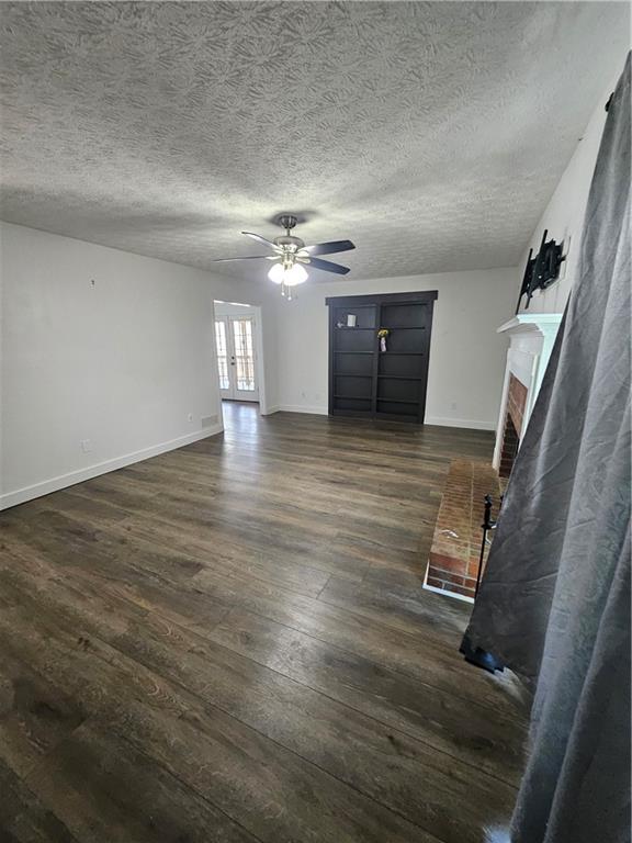 291 Sterling Trail Powder Springs, GA 30127 - Photo 7 of 43 wooden floor in an empty room with a window