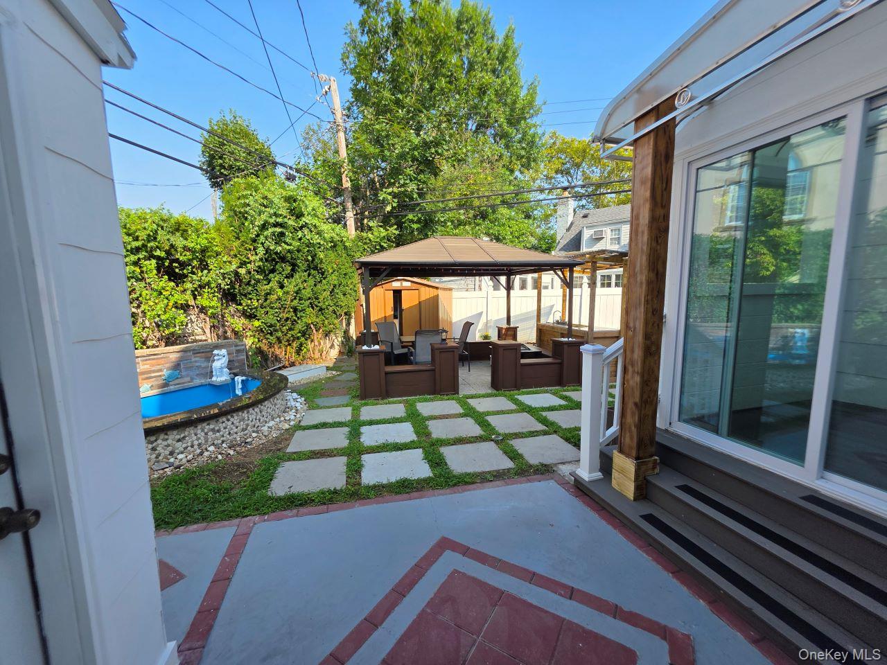 30 Aberdeen Road New Hyde Park, NY 11040 - Photo 21 of 37 a house view with a garden space