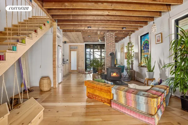 a lobby with furniture and floor to ceiling window