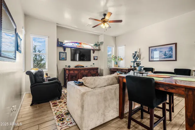 a living room with furniture and windows