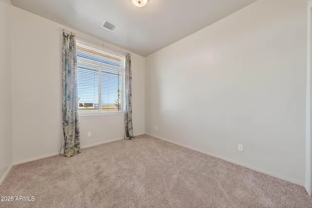 a view of a room and window