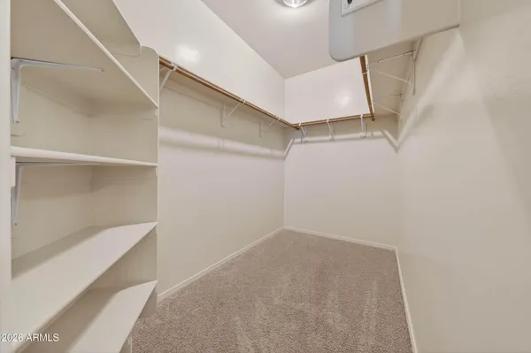 a view of an empty walk in closet