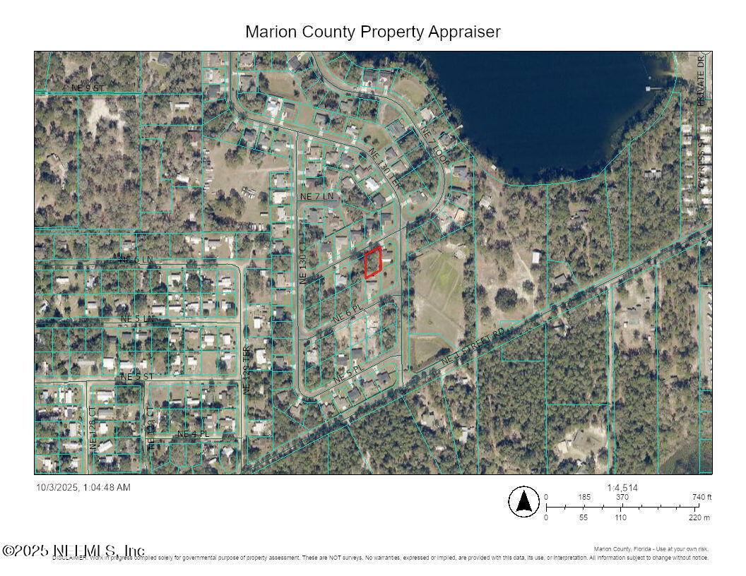 0 Northeast 7th Loop Silver Springs, FL 34488 - Photo 3 of 6 a black and white photo of a book