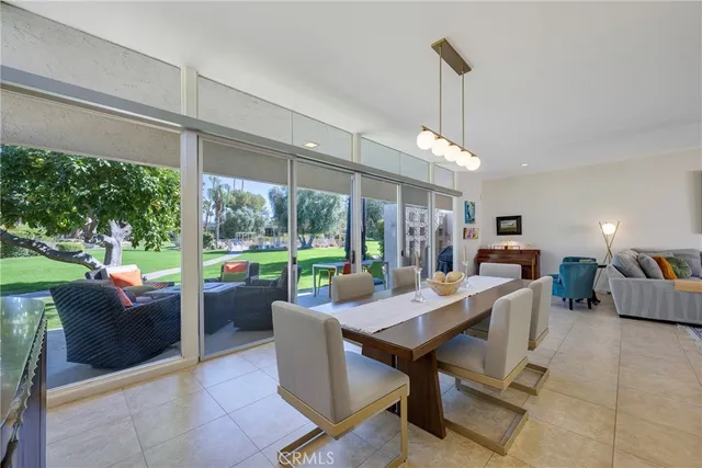 a view of a dining room and furniture window and outside view