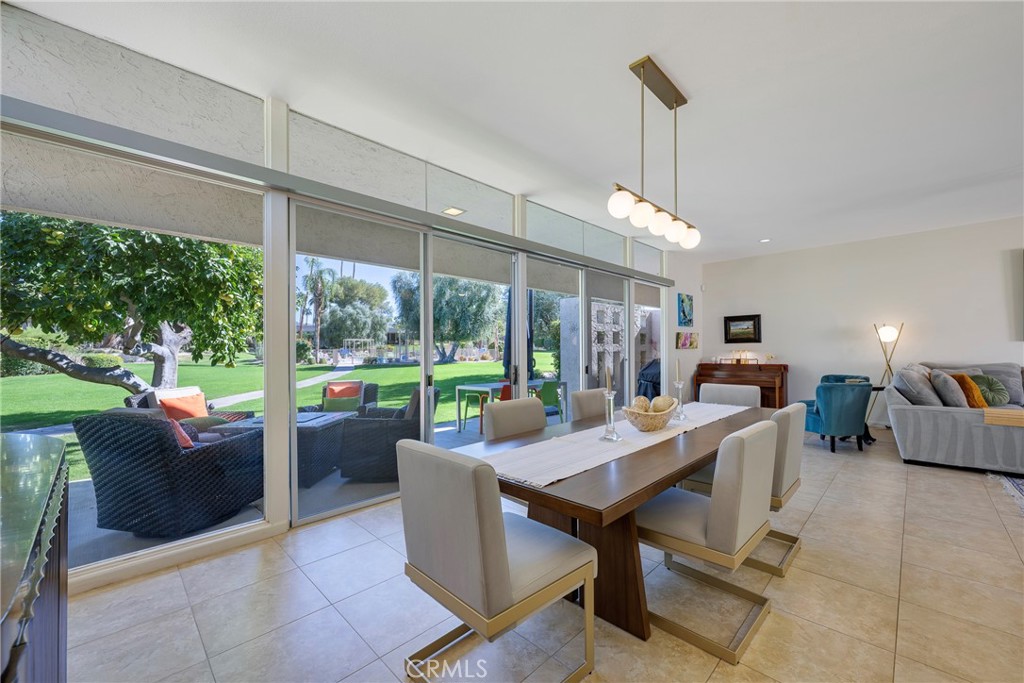 a view of a dining room and furniture window and outside view