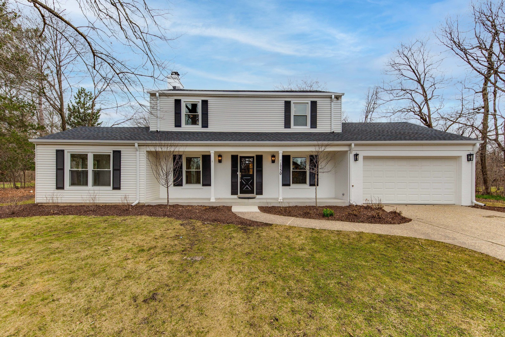1750 Meadow Lane Bannockburn, IL 60015 - Photo 1 of 19 front view of a house with a yard