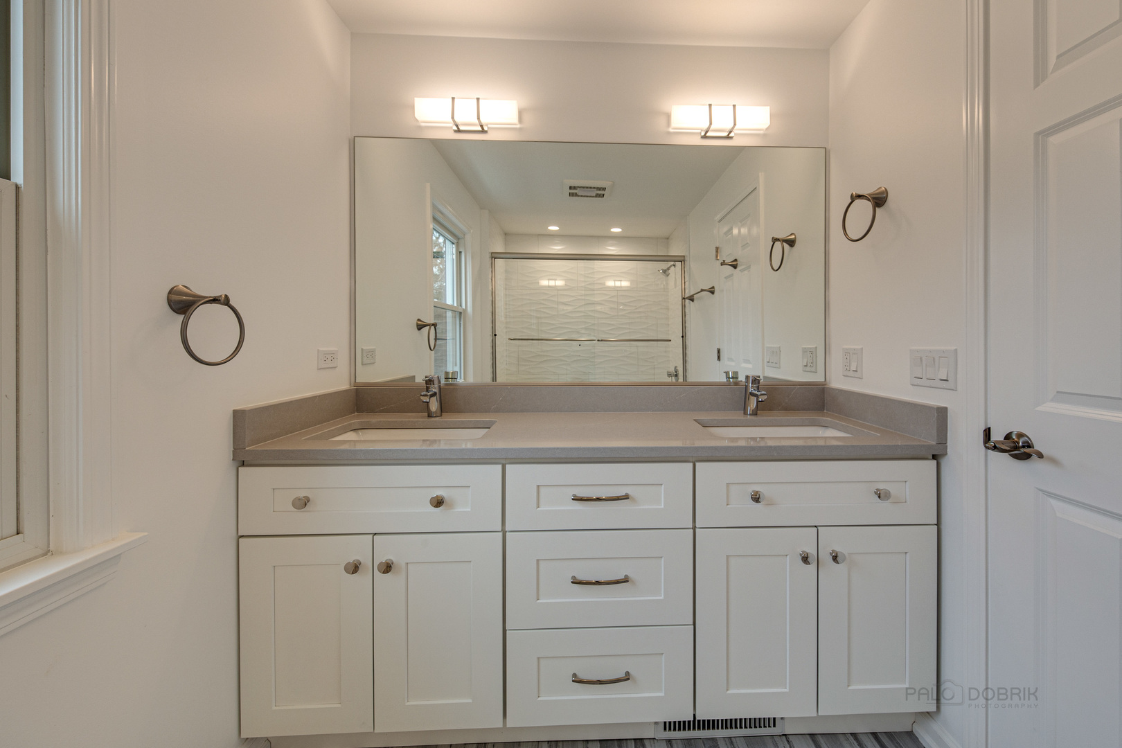 1750 Meadow Lane Bannockburn, IL 60015 - Photo 12 of 19 a bathroom with double sink and a mirror