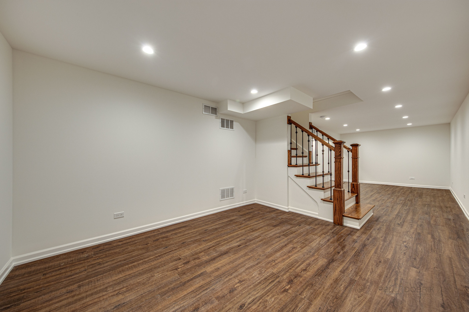 1750 Meadow Lane Bannockburn, IL 60015 - Photo 17 of 19 a view of an empty room with wooden floor