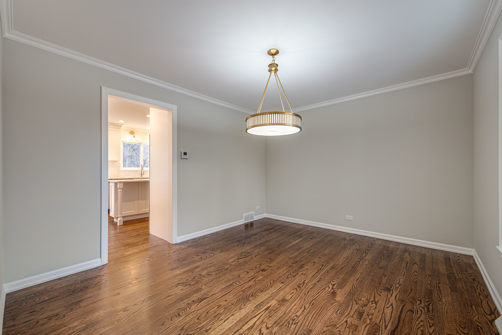 1750 Meadow Lane Bannockburn, IL 60015 - Photo 5 of 19 a view of empty room with wooden floor and window