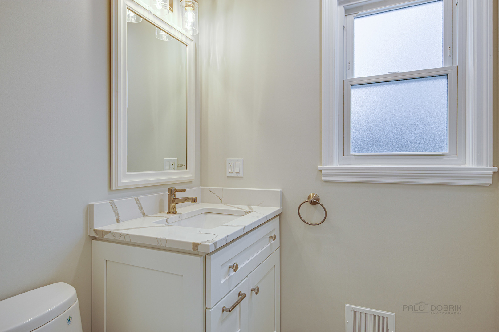 1750 Meadow Lane Bannockburn, IL 60015 - Photo 8 of 19 a bathroom with a granite countertop sink and a mirror
