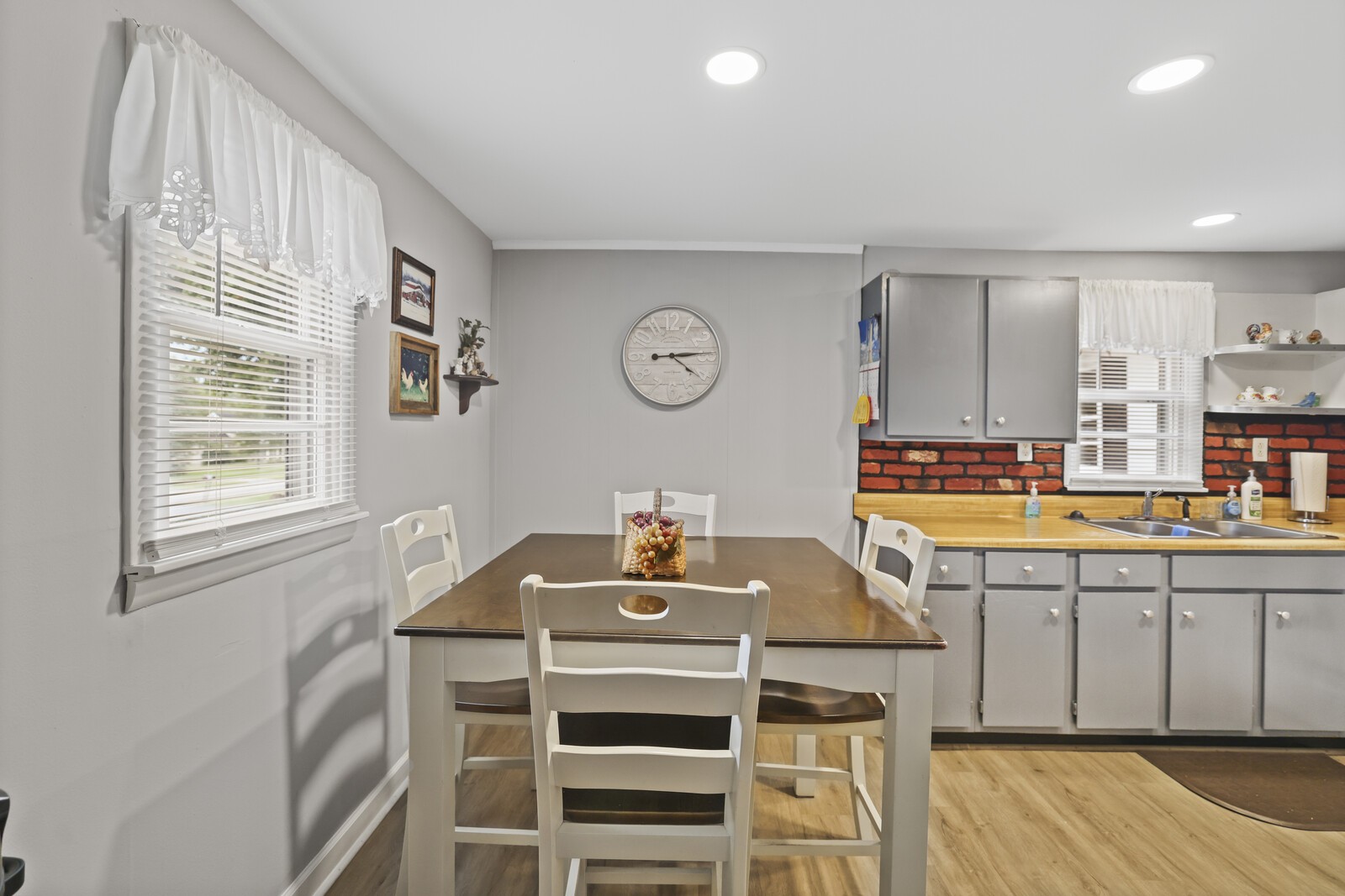 233 Rucker Road Murfreesboro, TN 37127 - Photo 13 of 55 a kitchen with a stove a sink and a refrigerator