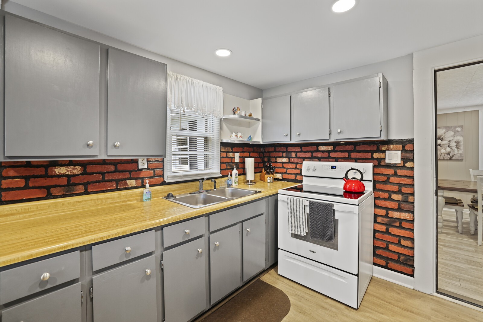 233 Rucker Road Murfreesboro, TN 37127 - Photo 16 of 55 a kitchen with a sink and cabinets