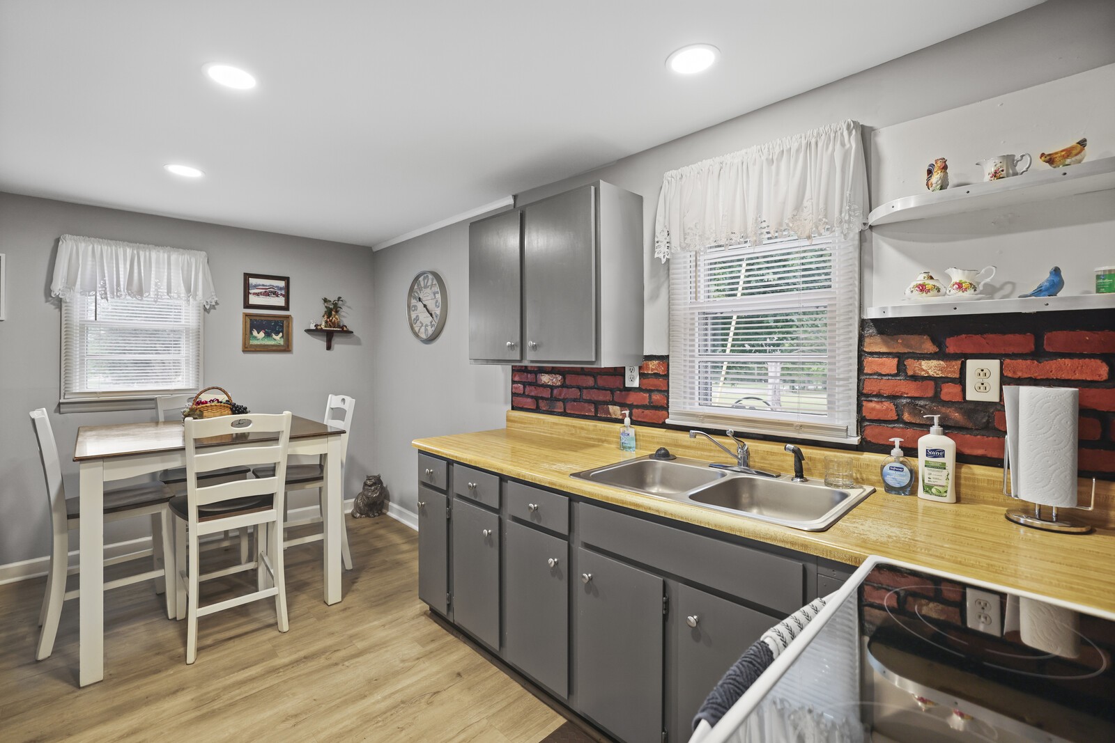 233 Rucker Road Murfreesboro, TN 37127 - Photo 19 of 55 a kitchen with a sink stove and cabinets