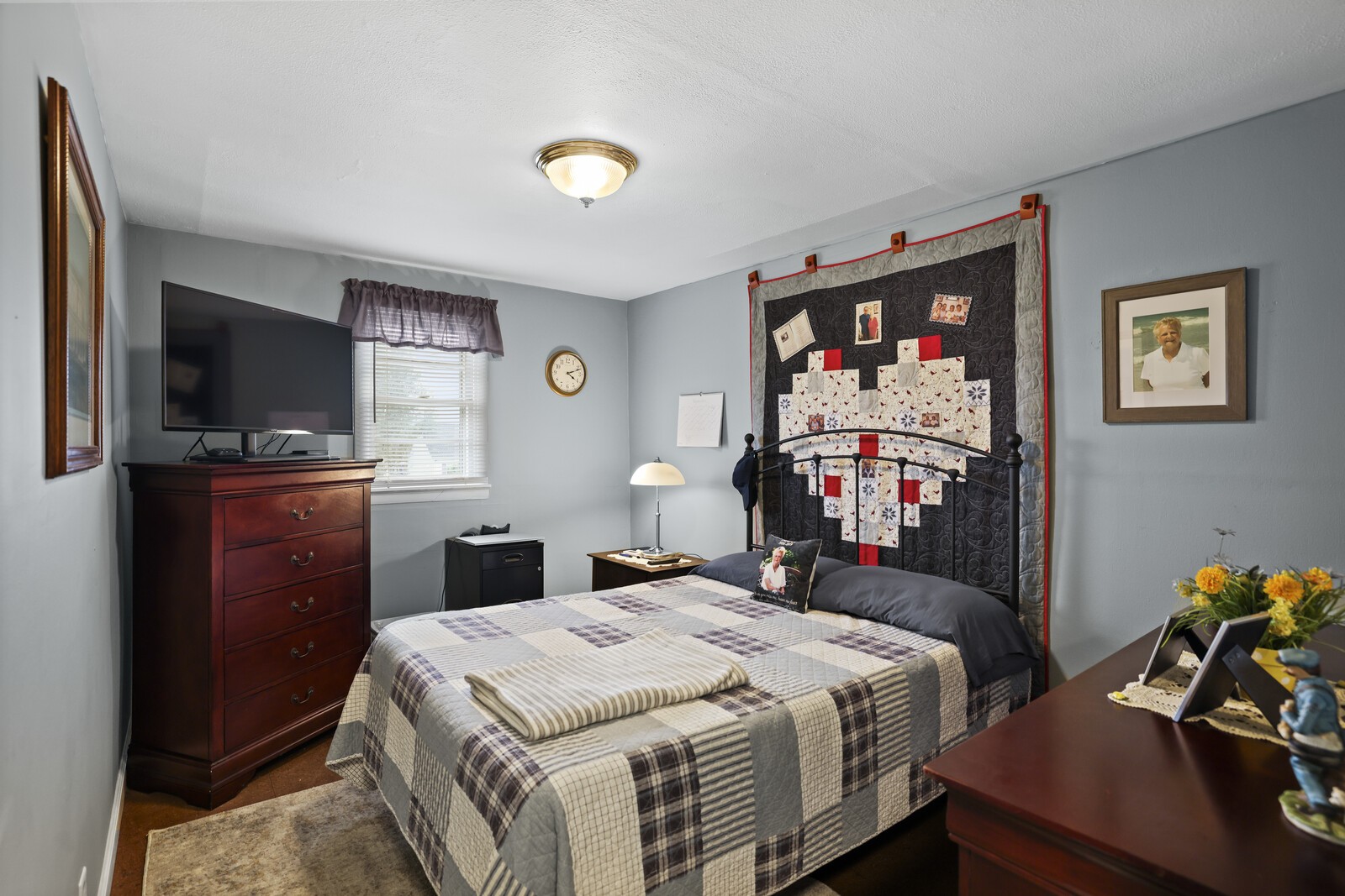 233 Rucker Road Murfreesboro, TN 37127 - Photo 20 of 55 a bedroom with a bed and a flat screen tv