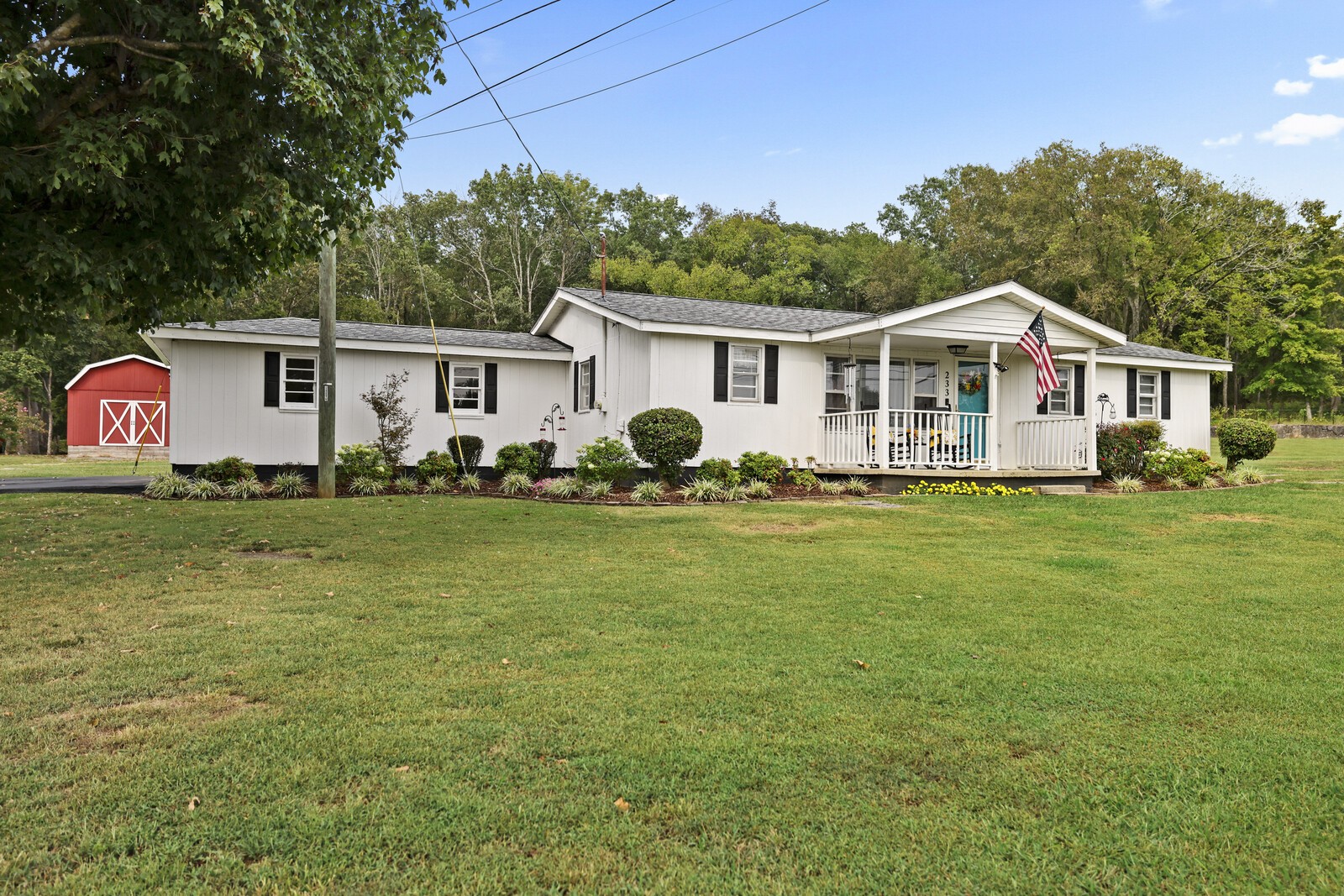 233 Rucker Road Murfreesboro, TN 37127 - Photo 2 of 55 a front view of a house with a garden