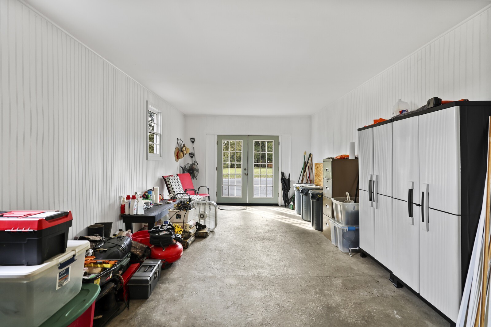 233 Rucker Road Murfreesboro, TN 37127 - Photo 36 of 55 a view of a livingroom with furniture fridge and workspace