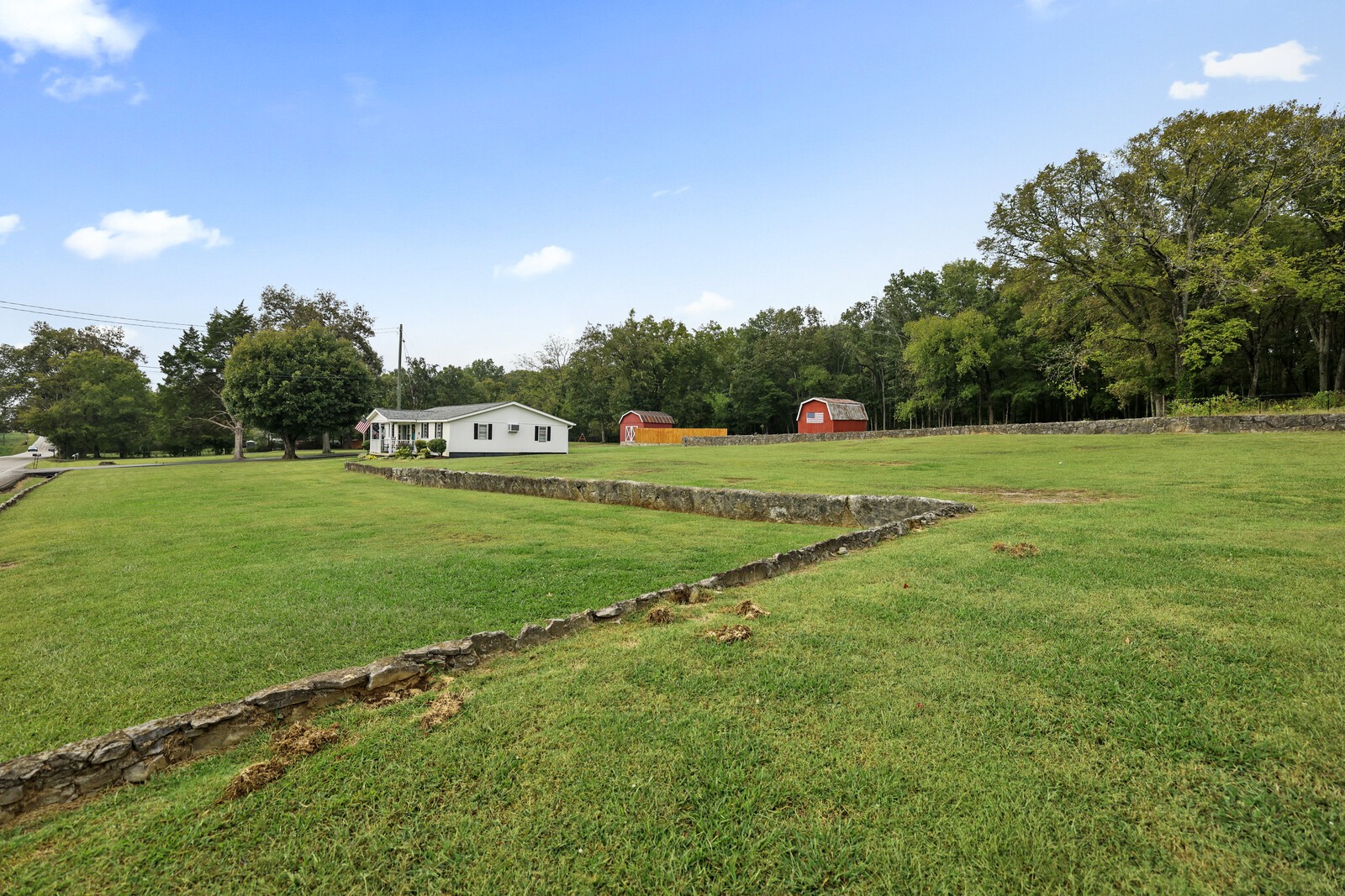 233 Rucker Road Murfreesboro, TN 37127 - Photo 37 of 55 a view of a golf course with a lake
