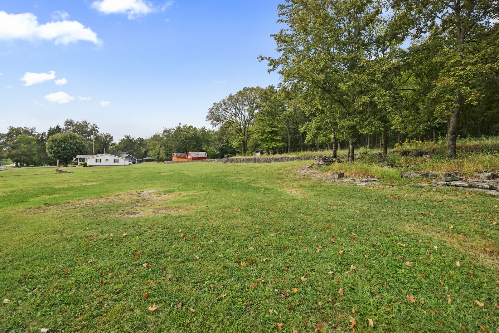 233 Rucker Road Murfreesboro, TN 37127 - Photo 38 of 55 a view of a green field with wooden fence