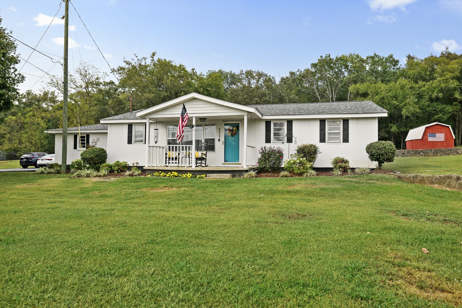 233 Rucker Road Murfreesboro, TN 37127 - Photo 4 of 55 a front view of a house with a garden