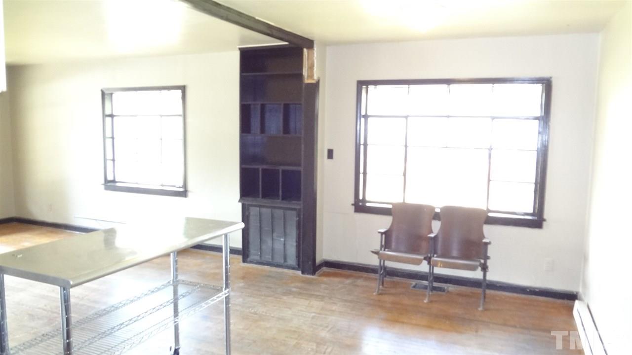 4200 Reavis Road Raleigh, NC 27606 - Photo 14 of 25 a living room with furniture and a window