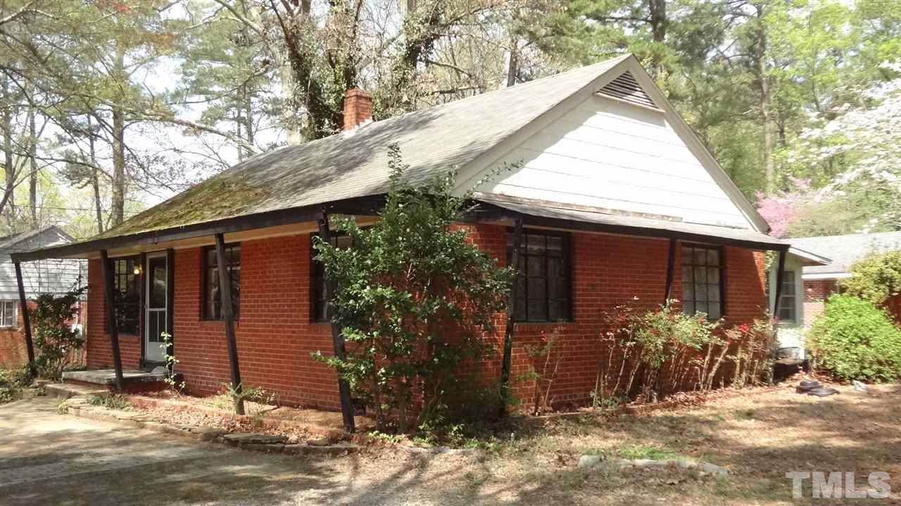 4200 Reavis Road Raleigh, NC 27606 - Photo 3 of 25 a view of a house with yard