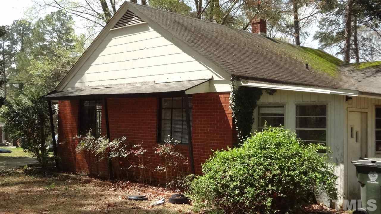 4200 Reavis Road Raleigh, NC 27606 - Photo 4 of 25 a view of a house with potted plants