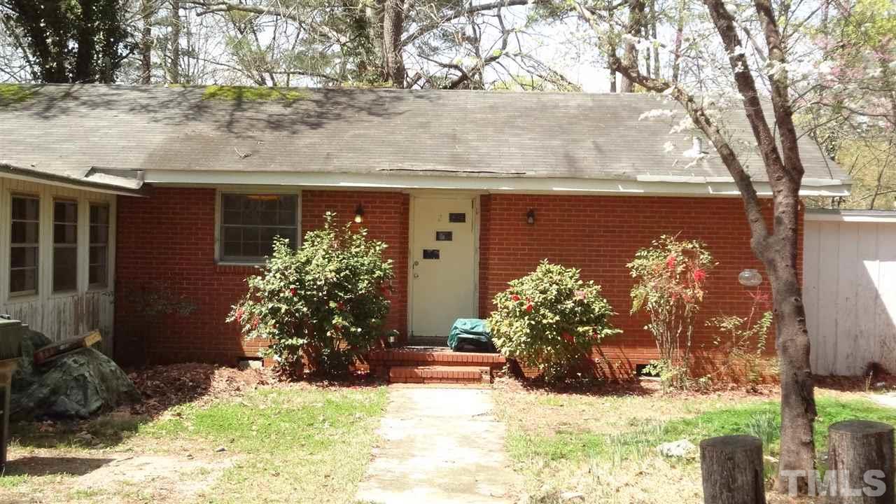 4200 Reavis Road Raleigh, NC 27606 - Photo 5 of 25 a view of a house with a yard