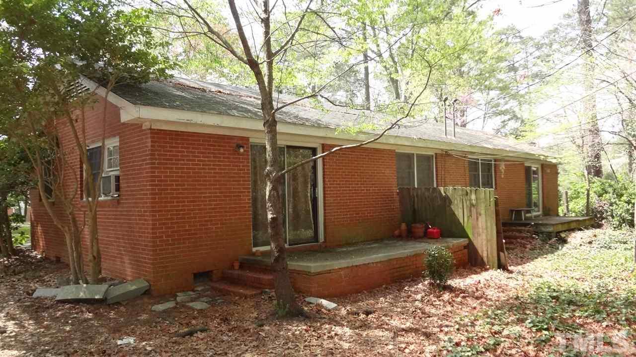 4200 Reavis Road Raleigh, NC 27606 - Photo 8 of 25 a view of a house with a yard