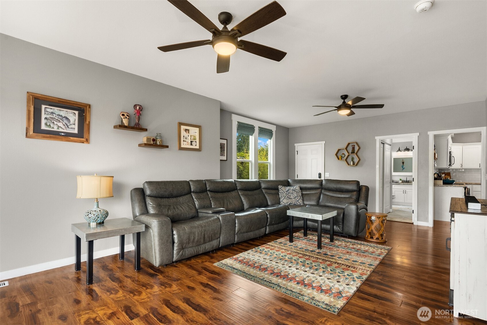 1002 Thompson Street Sumner, WA 98390 - Photo 11 of 38 a living room with furniture and a rug