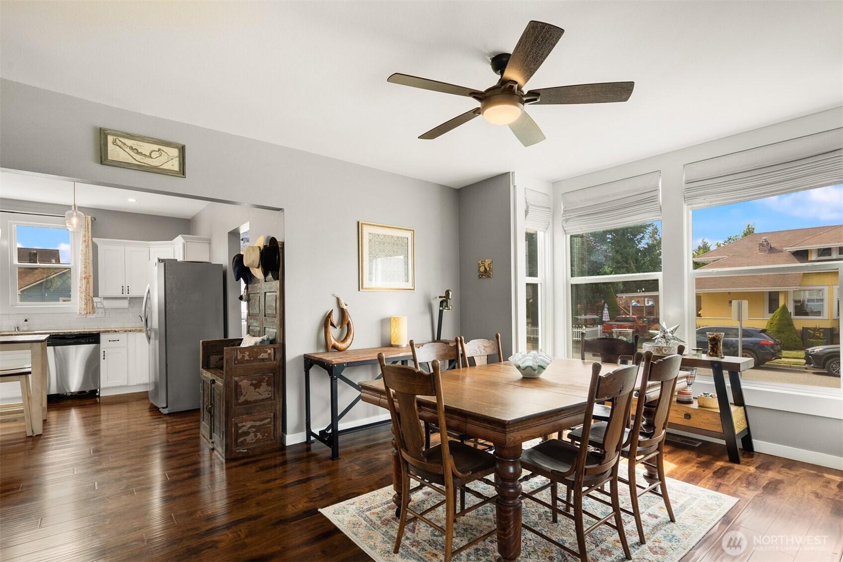 1002 Thompson Street Sumner, WA 98390 - Photo 20 of 38 a view of a dining room with furniture and wooden floor