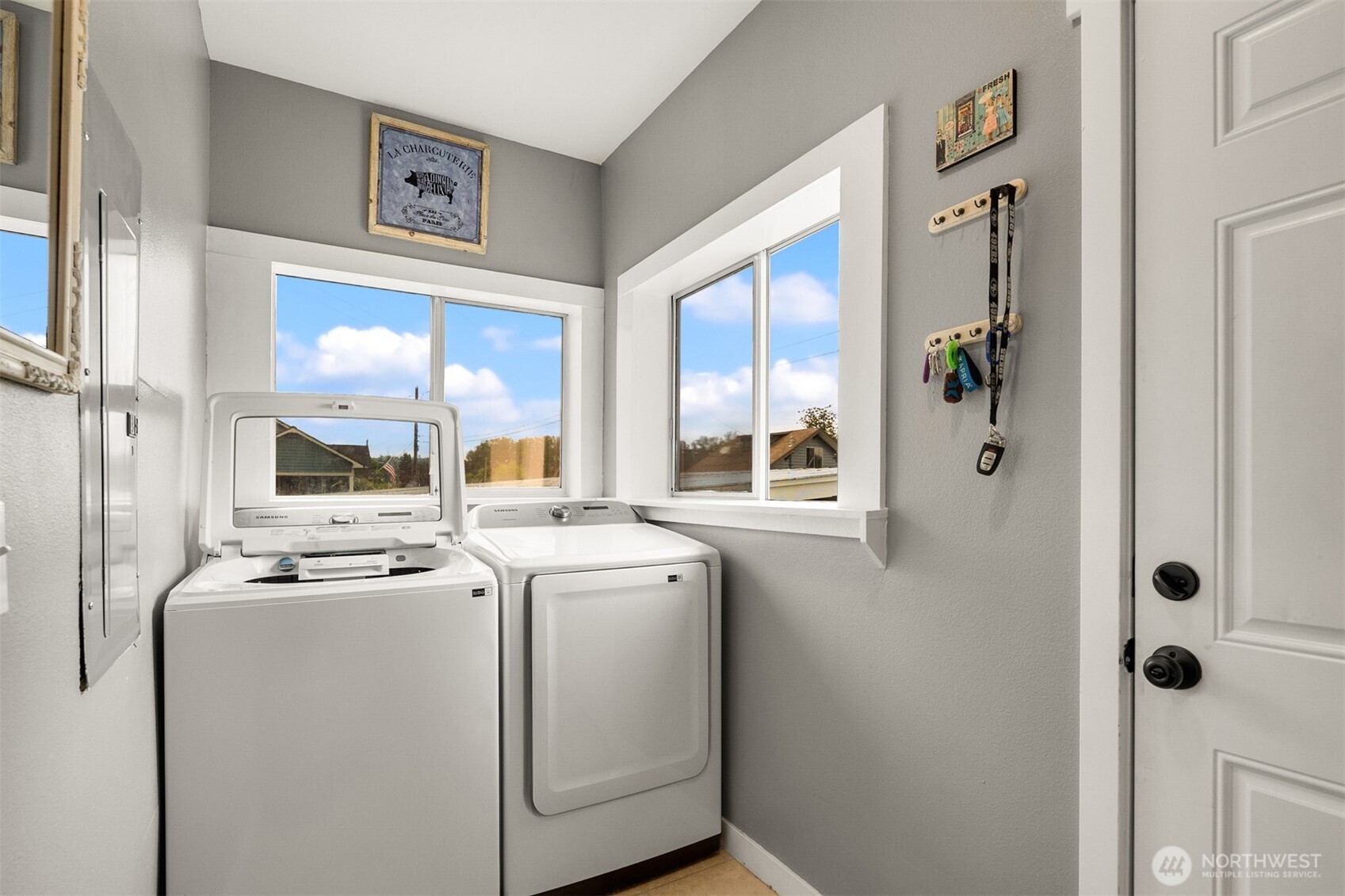 1002 Thompson Street Sumner, WA 98390 - Photo 29 of 38 a room with dryer and washer