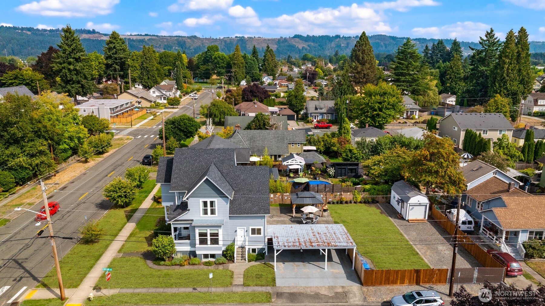 1002 Thompson Street Sumner, WA 98390 - Photo 35 of 38 a view of multiple houses with a city street