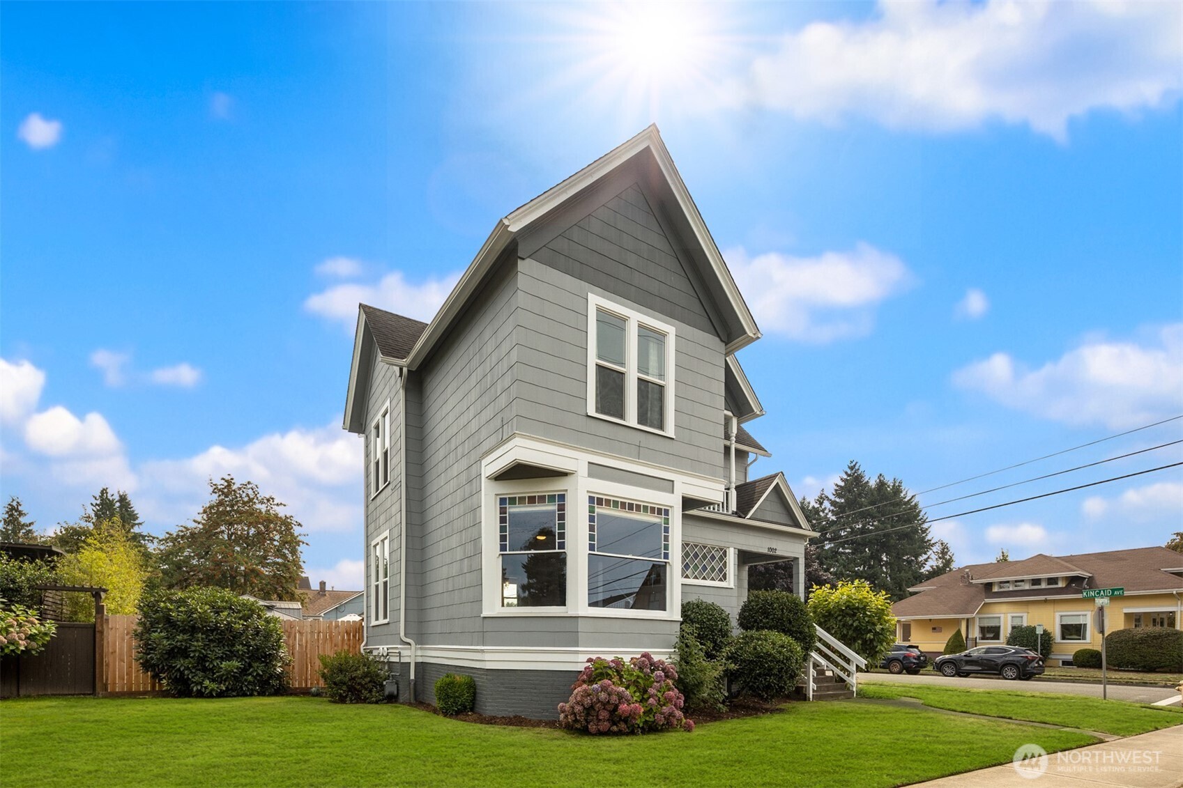 1002 Thompson Street Sumner, WA 98390 - Photo 37 of 38 a front view of a house with a yard