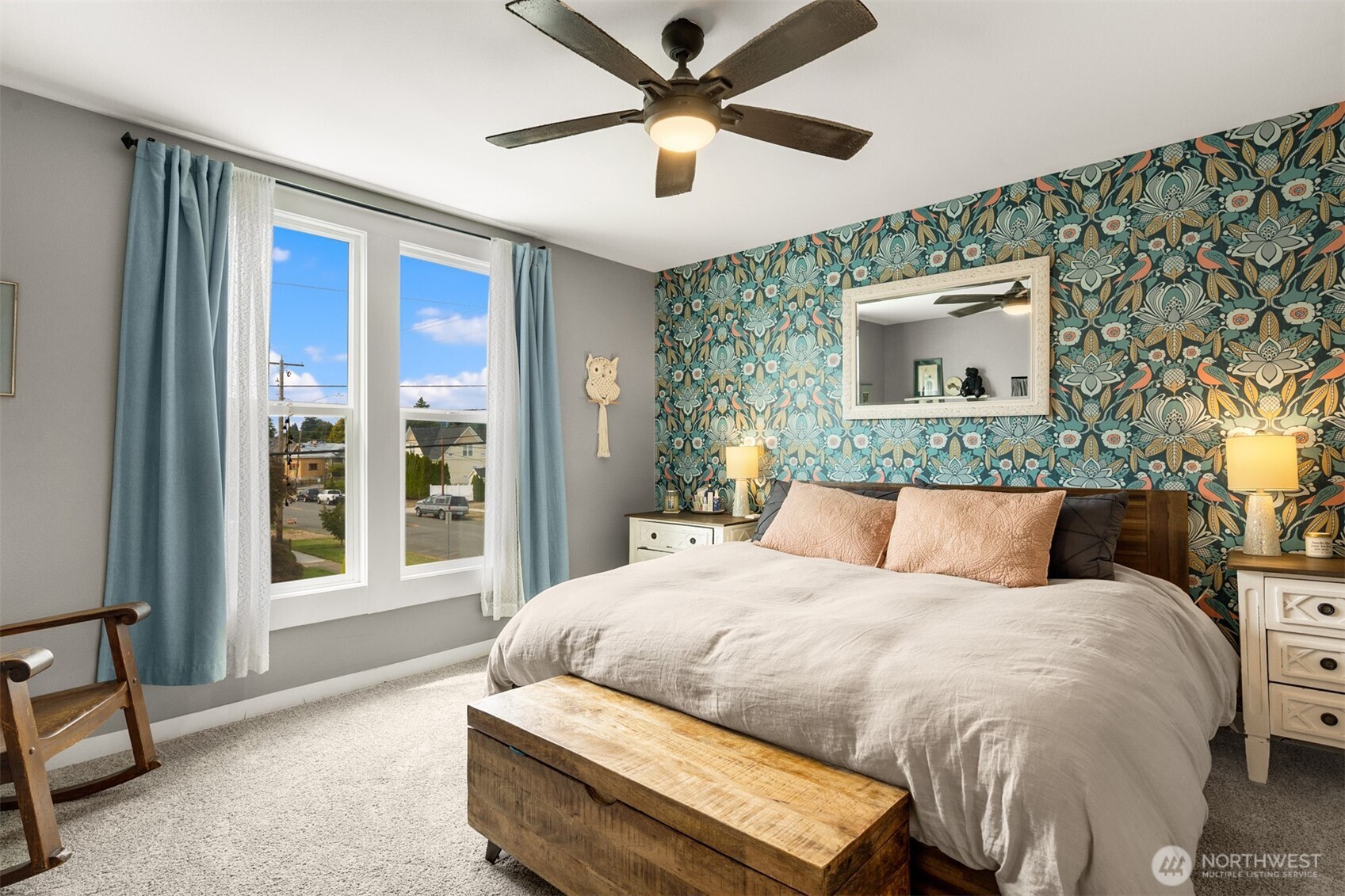 1002 Thompson Street Sumner, WA 98390 - Photo 4 of 38 a bedroom with a bed and a large window