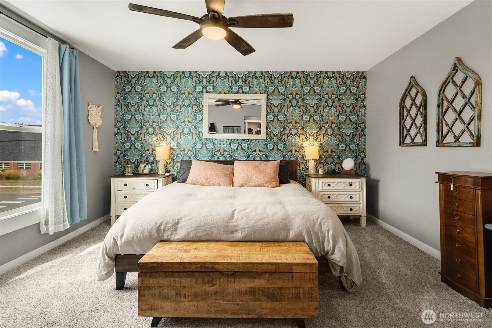 1002 Thompson Street Sumner, WA 98390 - Photo 8 of 38 a bedroom with a bed and wooden floor