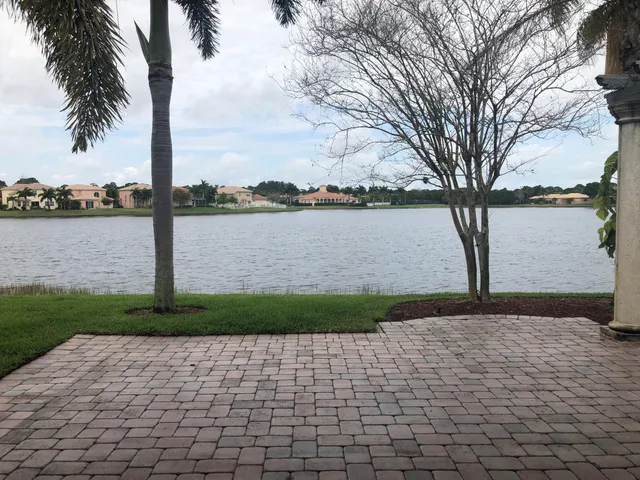 a view of a backyard of the house