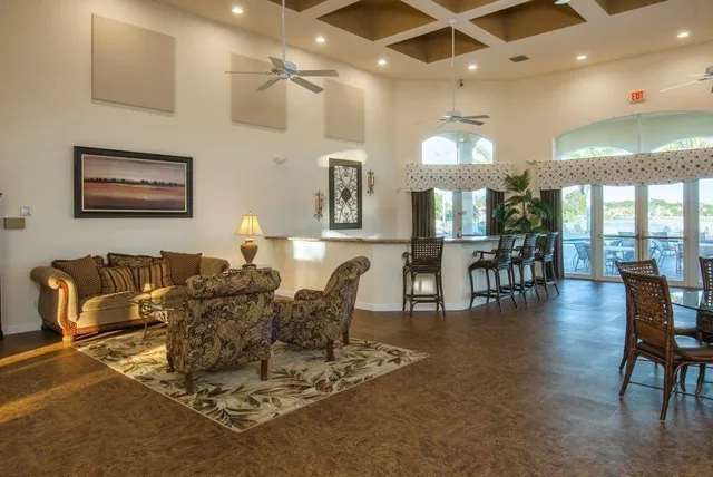 a room with gym equipment and large mirror