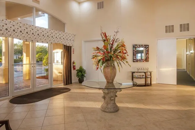 a view of a backyard with a garden and plants