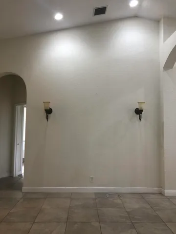 an empty room with windows