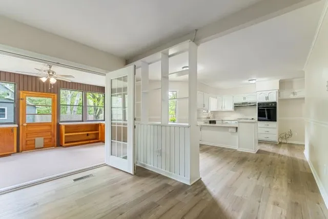 a view of kitchen with stainless steel appliances refrigerator oven and stove