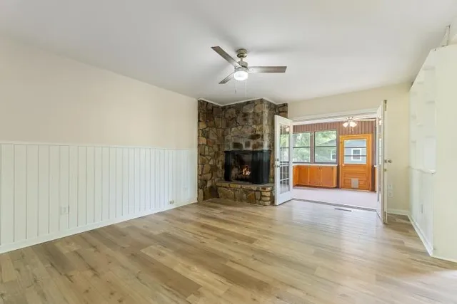 a bedroom with a bed and a view of bedroom