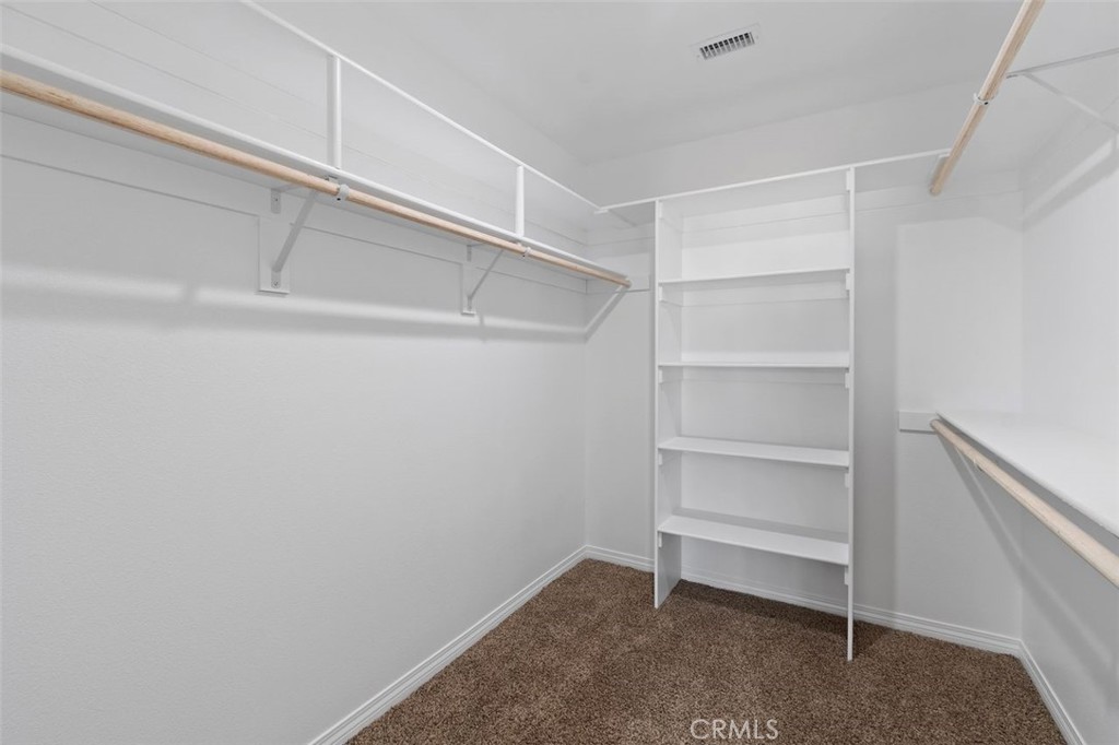 16925 Nanticoke Road Apple Valley, CA 92307 - Photo 22 of 42 a view of an empty walk in closet