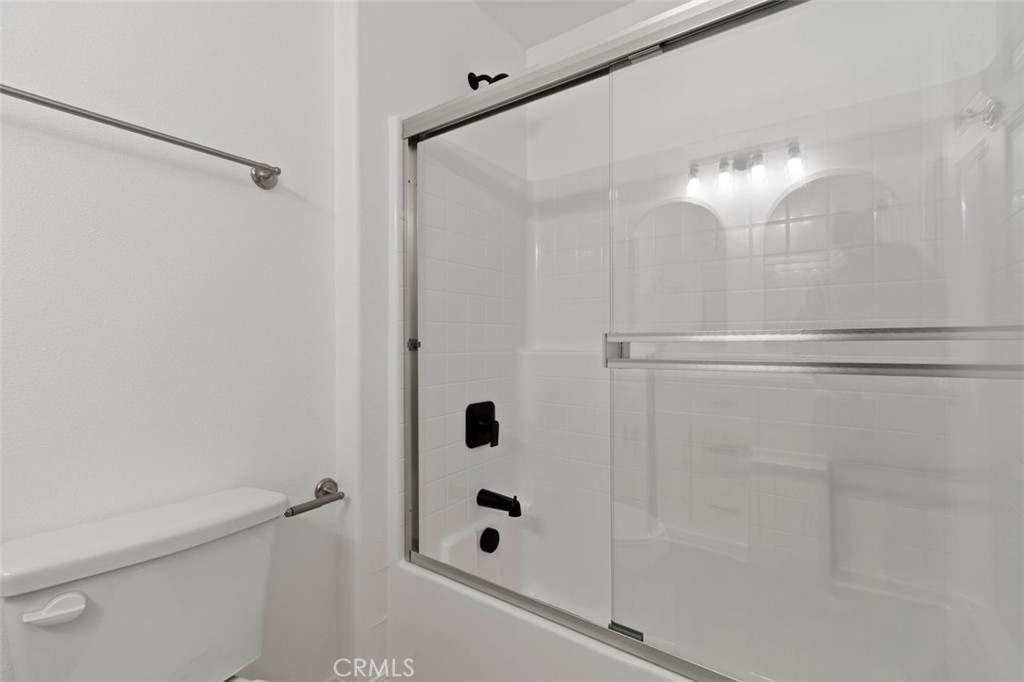 16925 Nanticoke Road Apple Valley, CA 92307 - Photo 25 of 42 a bathroom with a shower