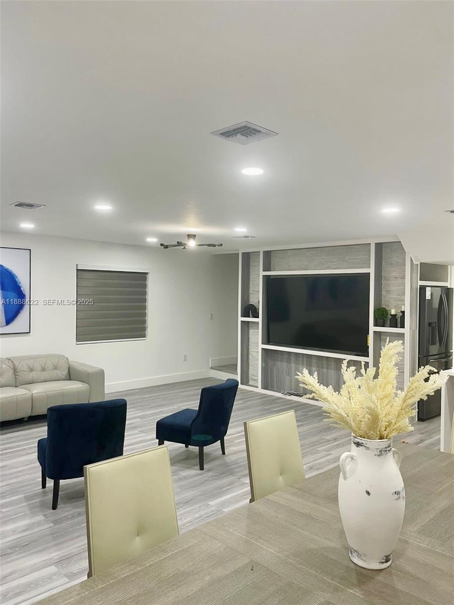 20 Eagle Drive Key Largo, FL 33037 - Photo 13 of 55 a living room with furniture and a flat screen tv