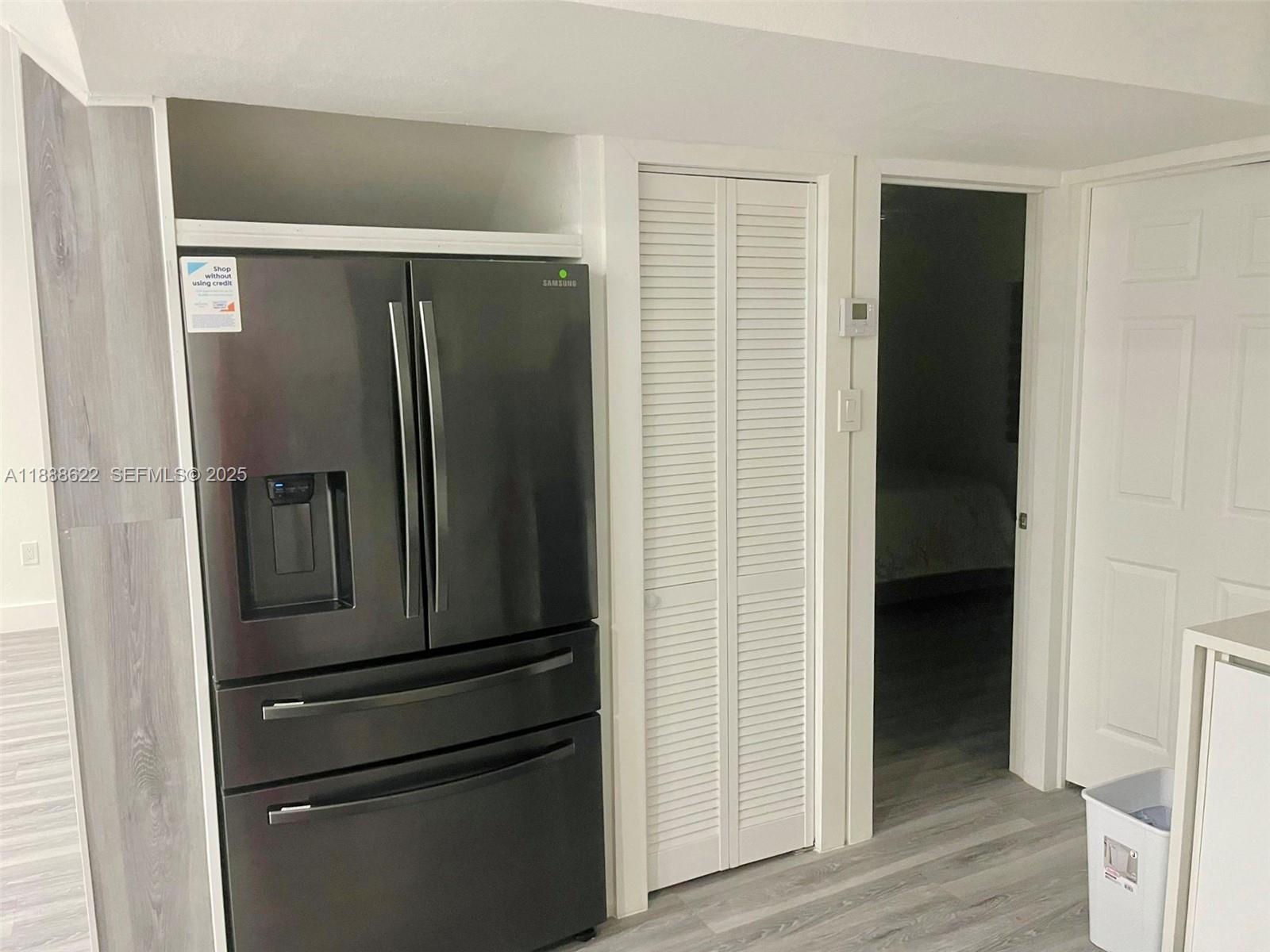20 Eagle Drive Key Largo, FL 33037 - Photo 16 of 55 a metallic refrigerator freezer sitting in a kitchen