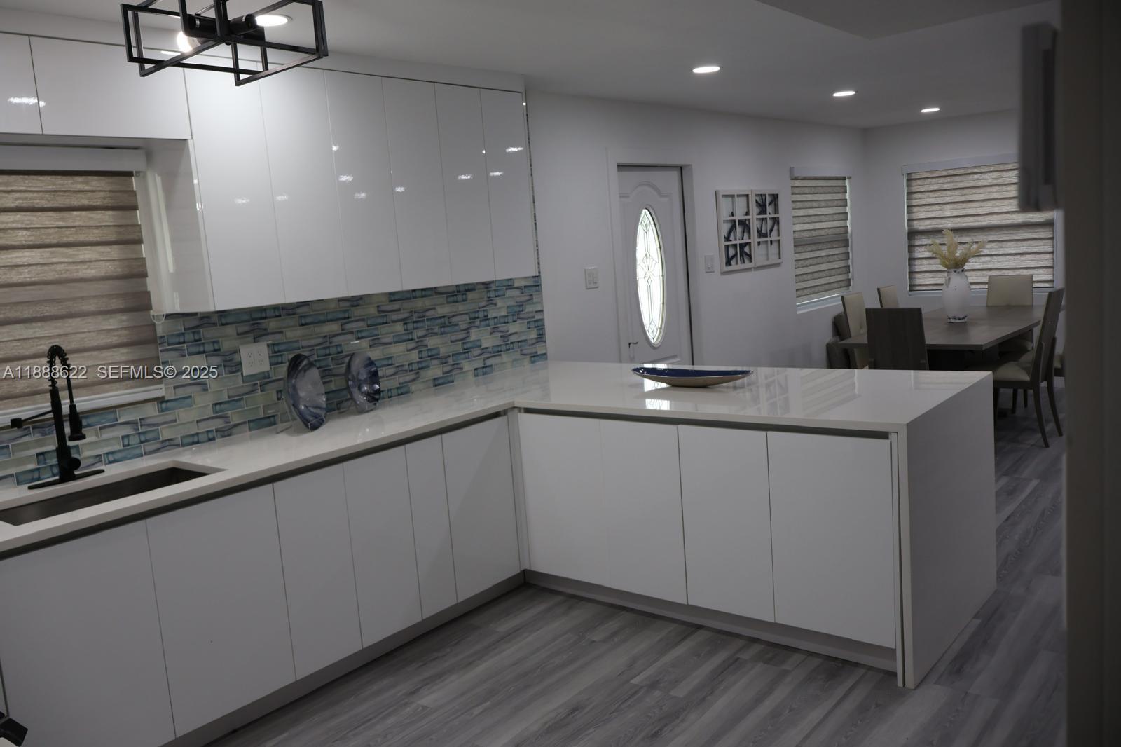 20 Eagle Drive Key Largo, FL 33037 - Photo 19 of 55 a kitchen with stainless steel appliances granite countertop a sink and a refrigerator