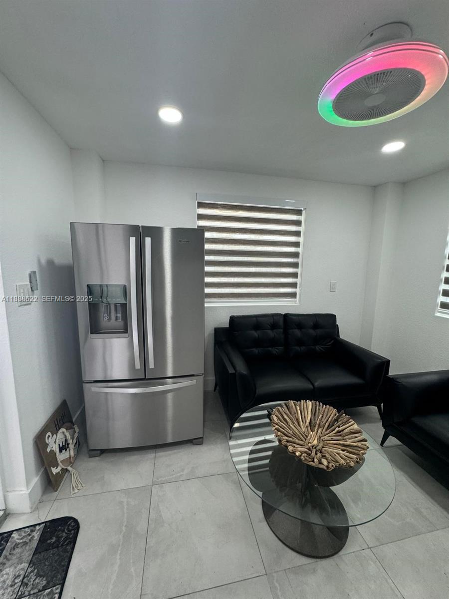 20 Eagle Drive Key Largo, FL 33037 - Photo 21 of 55 a kitchen with a refrigerator and cabinets