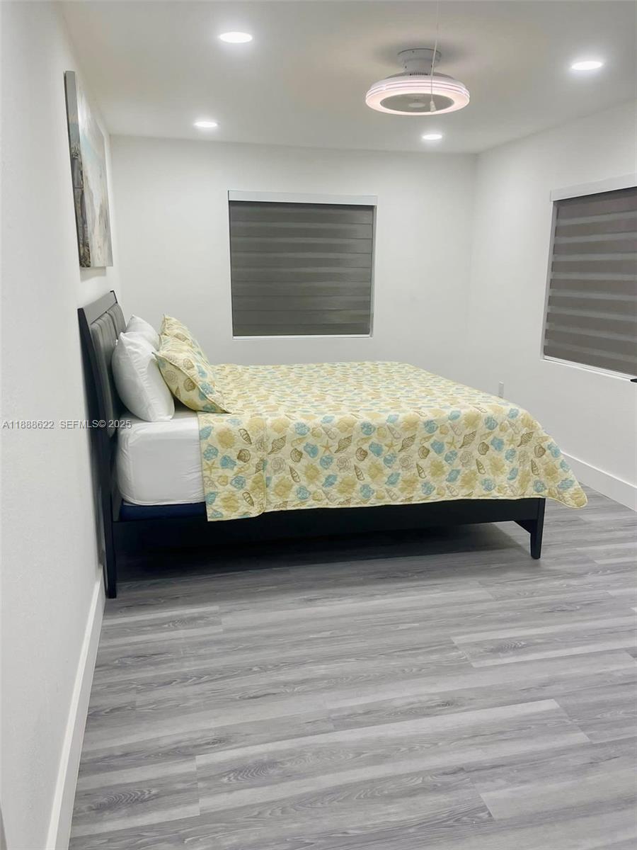 20 Eagle Drive Key Largo, FL 33037 - Photo 40 of 55 a bed sitting in a bedroom next to a window