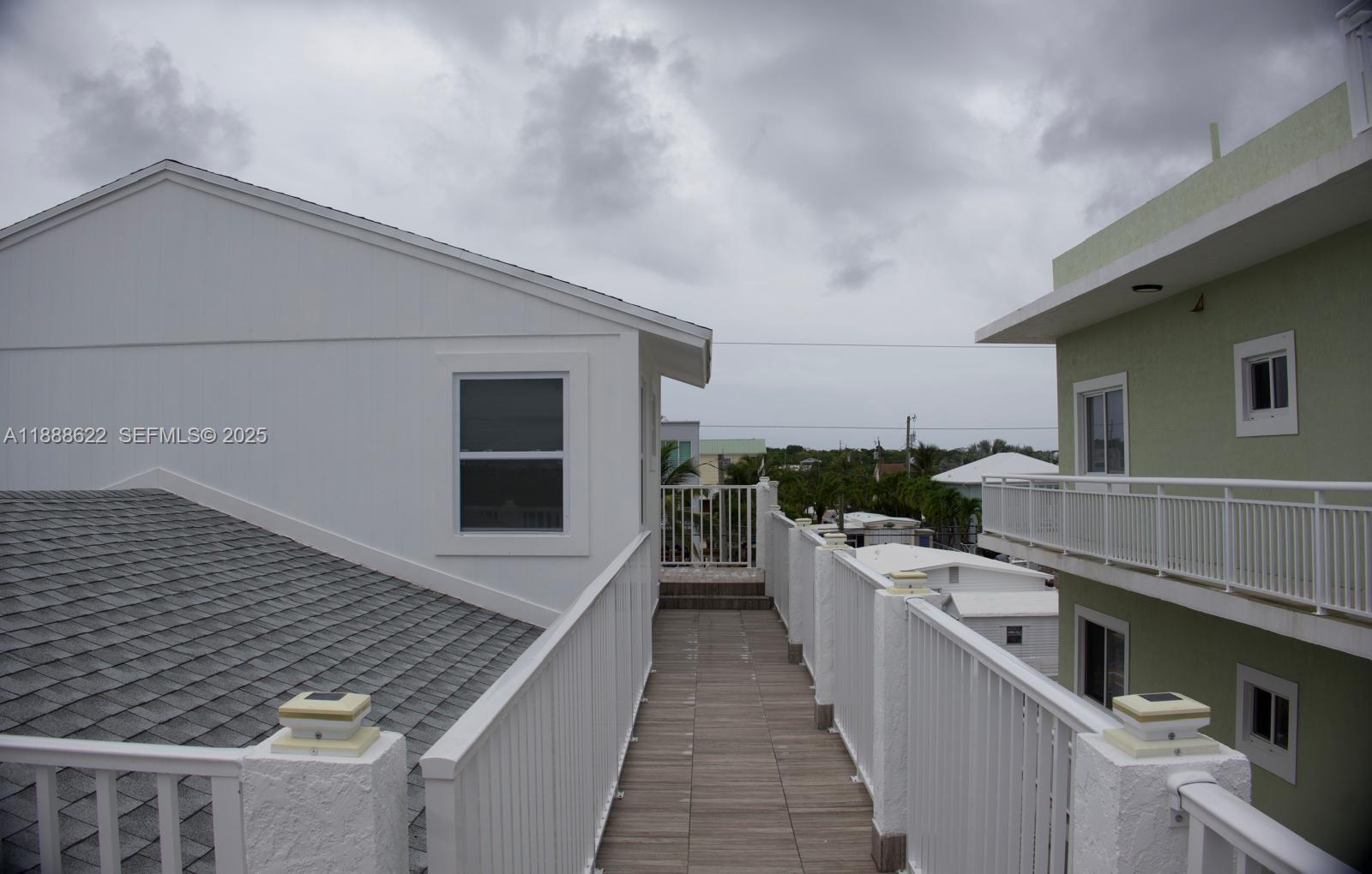 20 Eagle Drive Key Largo, FL 33037 - Photo 51 of 55 a kitchen with stainless steel appliances a sink dishwasher stove and oven